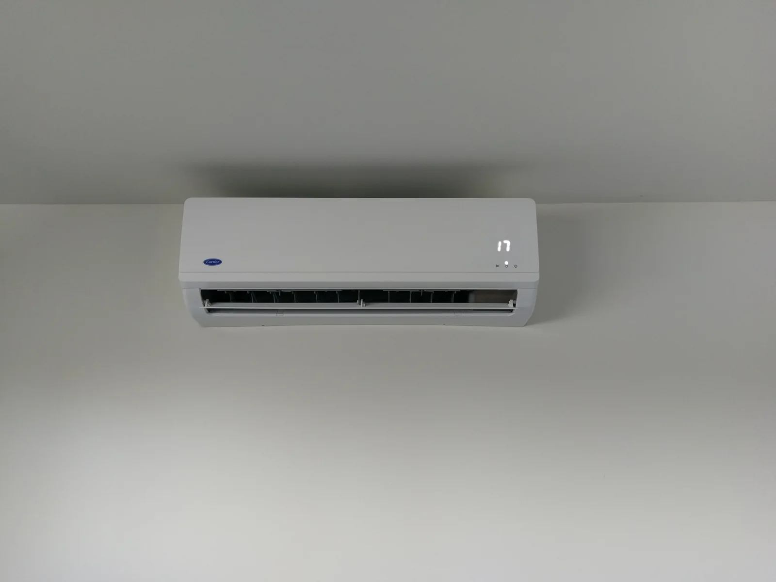 Carrier split system head installed on a plain wall