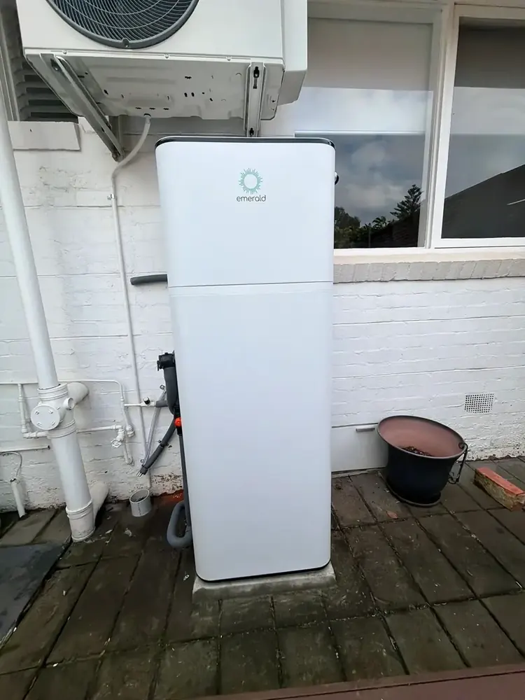 Emerald Energy heat pump installed on a deck