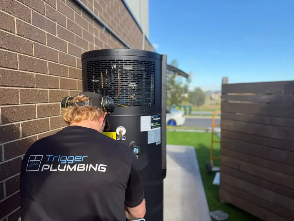 Trigger Group plumber installing a NeoPower heat pump