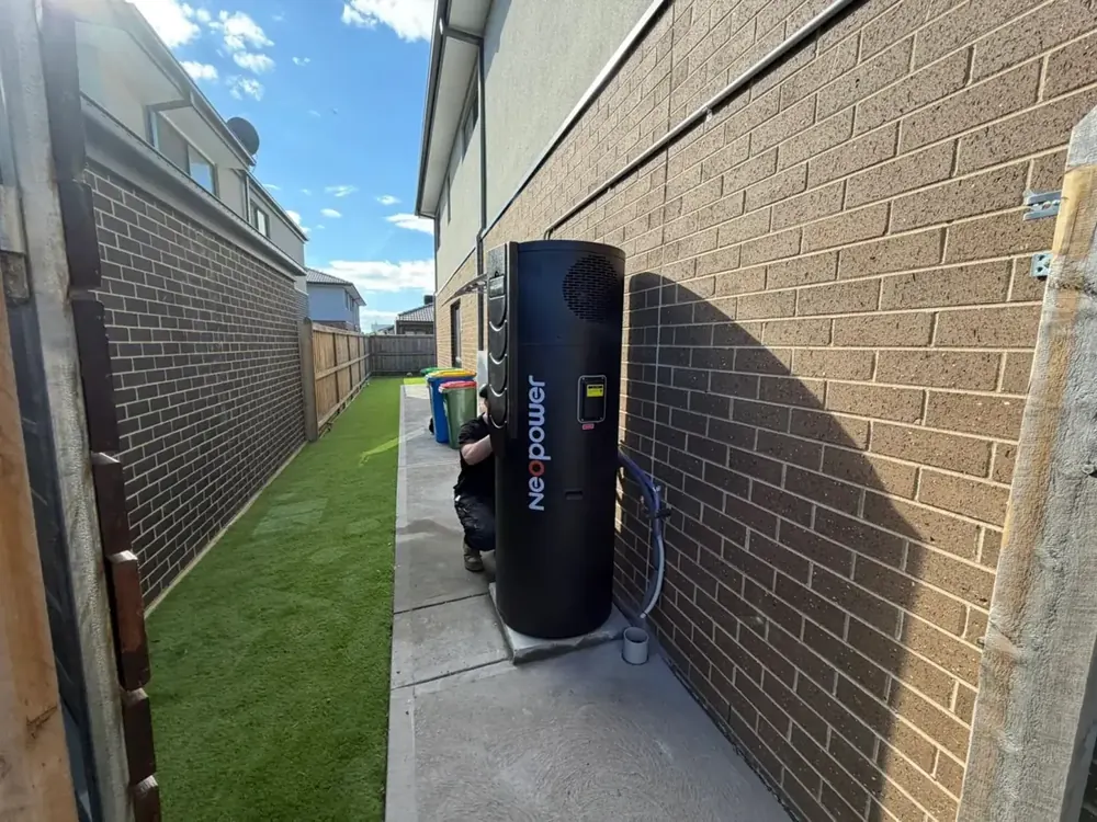 NeoPower heat pump installed along a side path