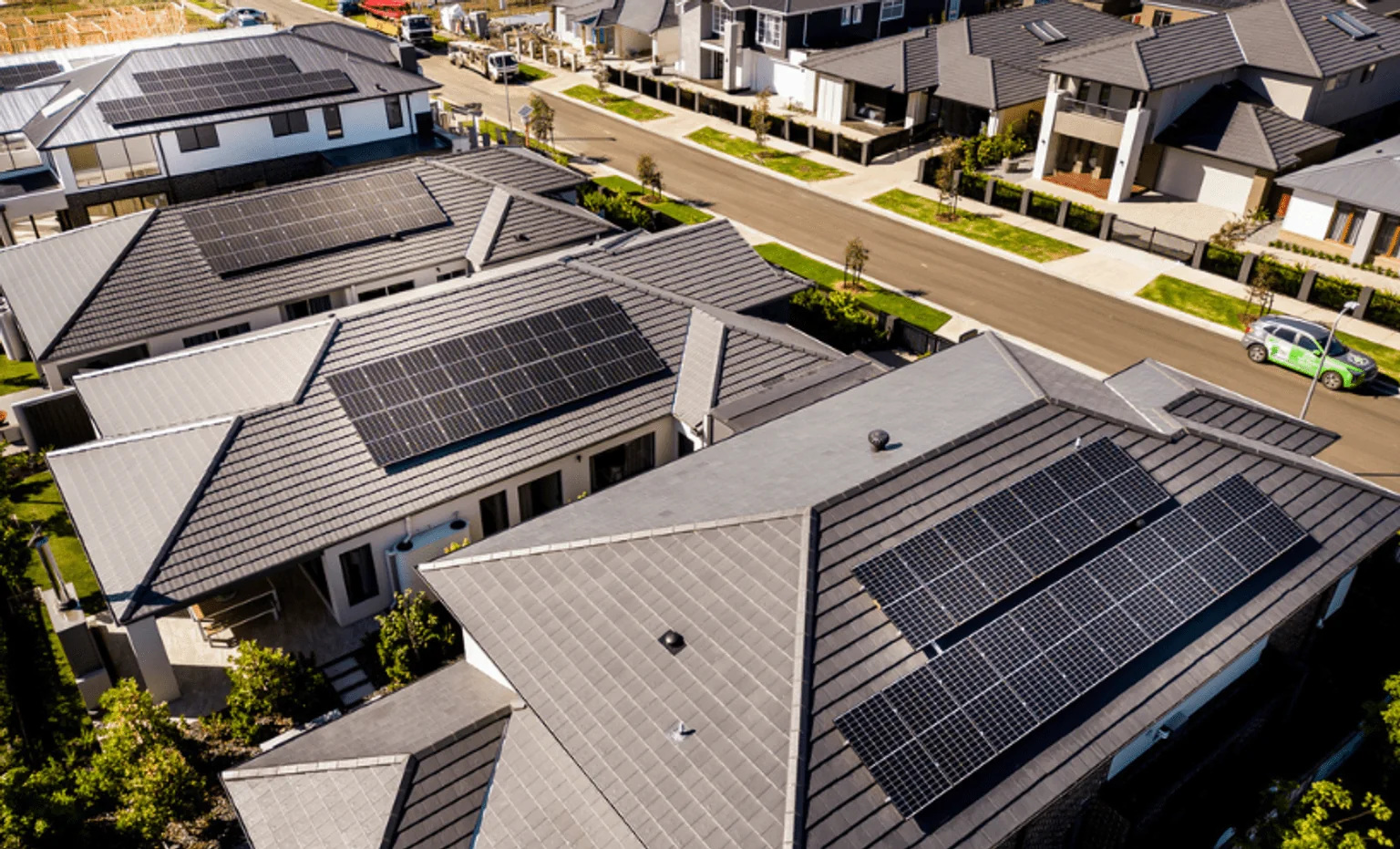 Aerial view of a Melbourne housing estate with rooftop solar installed by Trigger Group